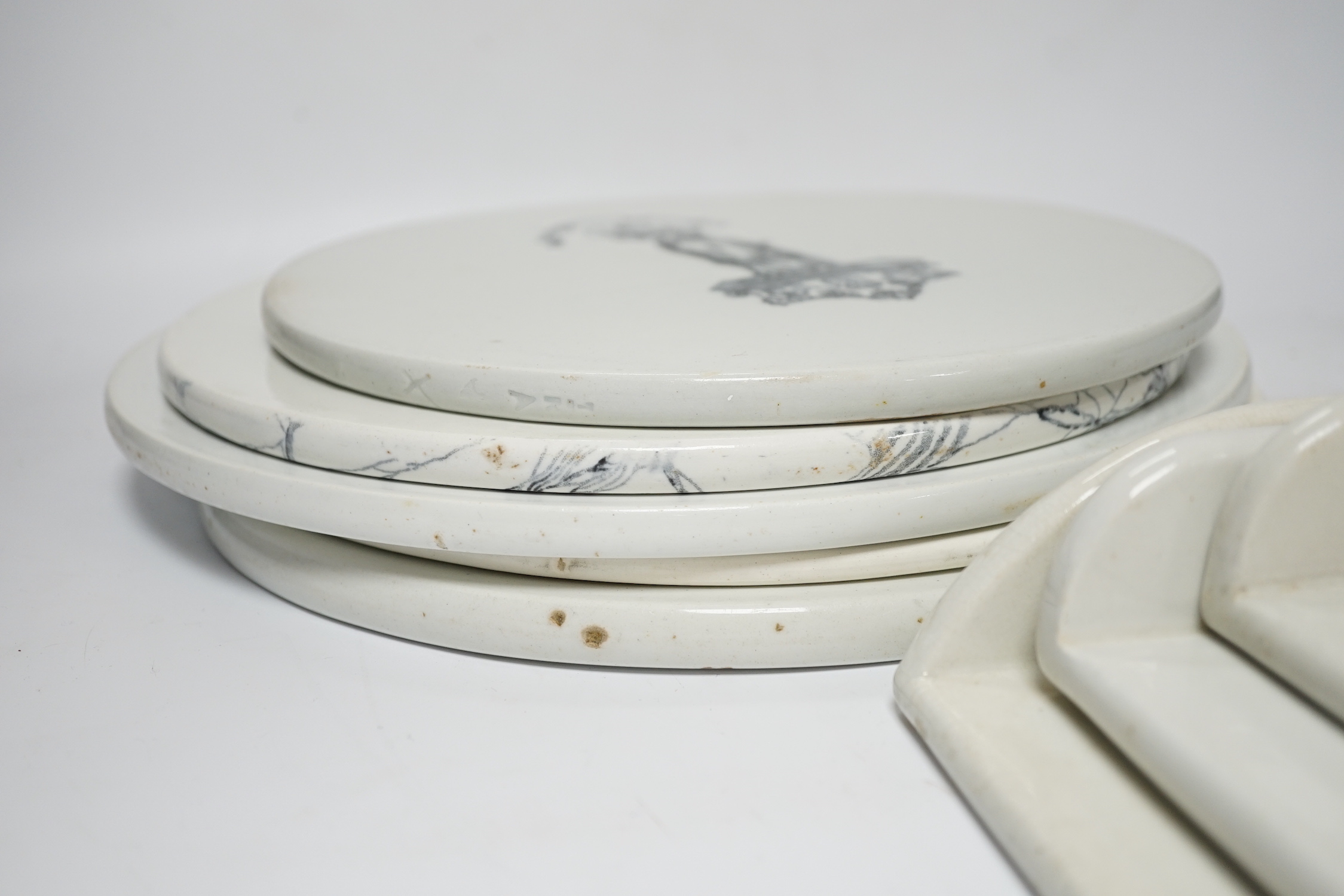 A group of eight Victorian ceramic scale platters